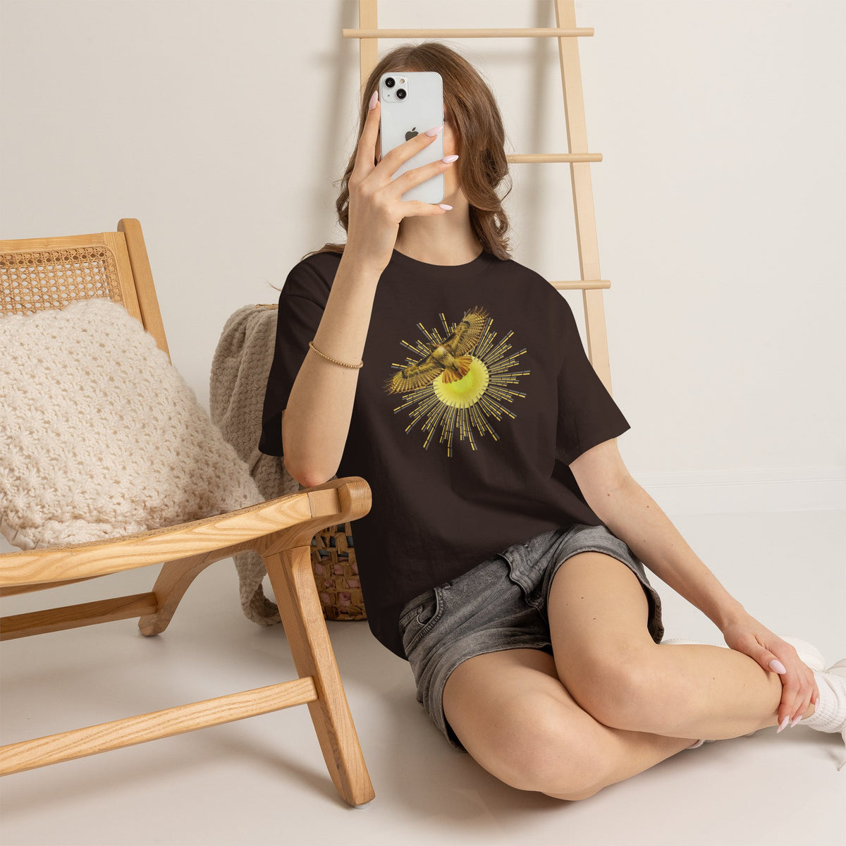 T-shirt featuring a photograph of a Flying Red-tailed Hawk in front of a Sun Patterned Design!