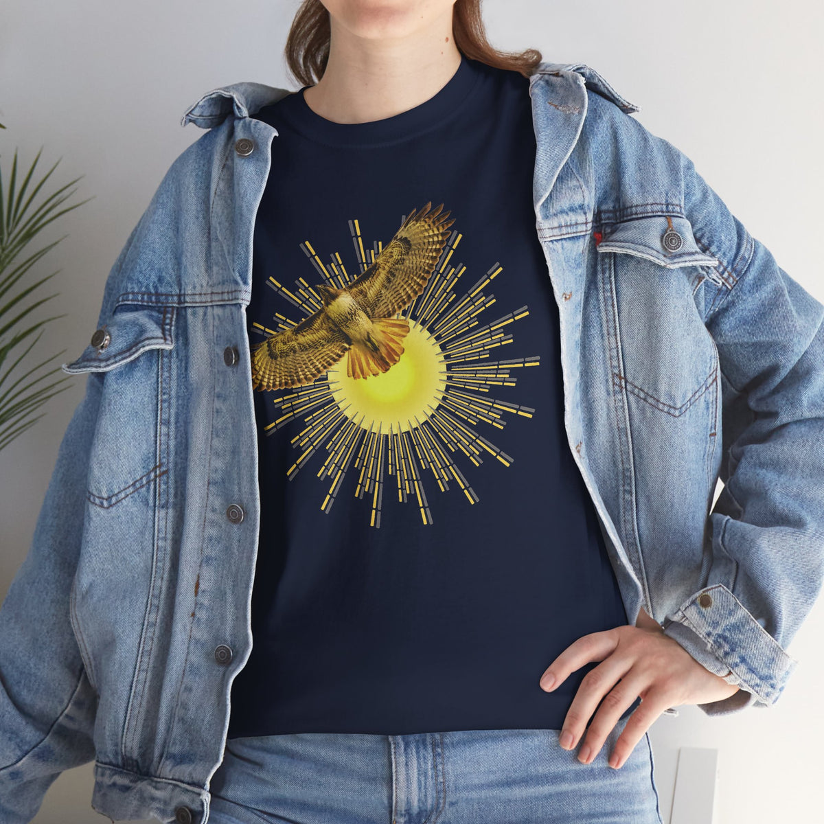 T-shirt featuring a photograph of a Flying Red-tailed Hawk in front of a Sun Patterned Design!