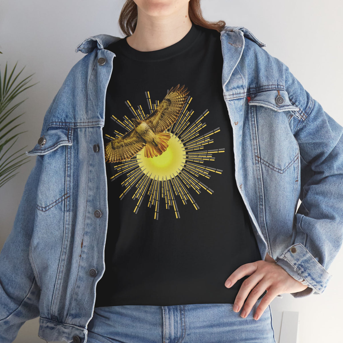T-shirt featuring a photograph of a Flying Red-tailed Hawk in front of a Sun Patterned Design!